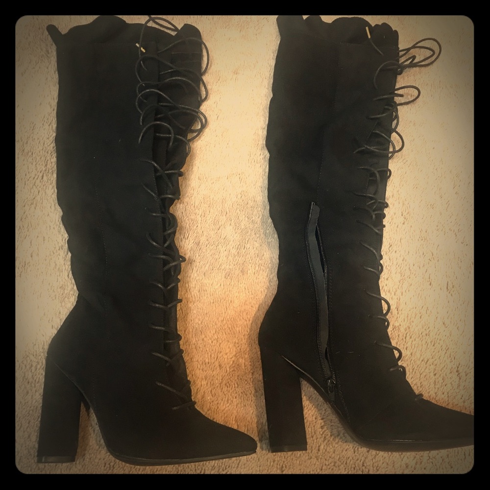 Brand new black thigh high boots. 6.5